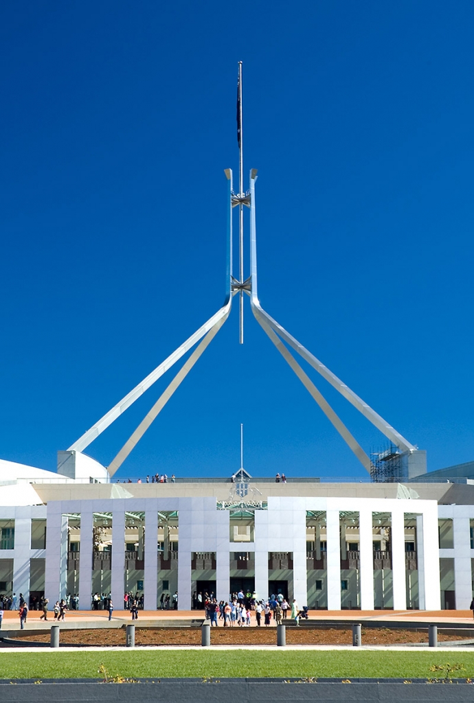 Australian parliament house in Canberra against a blue sky